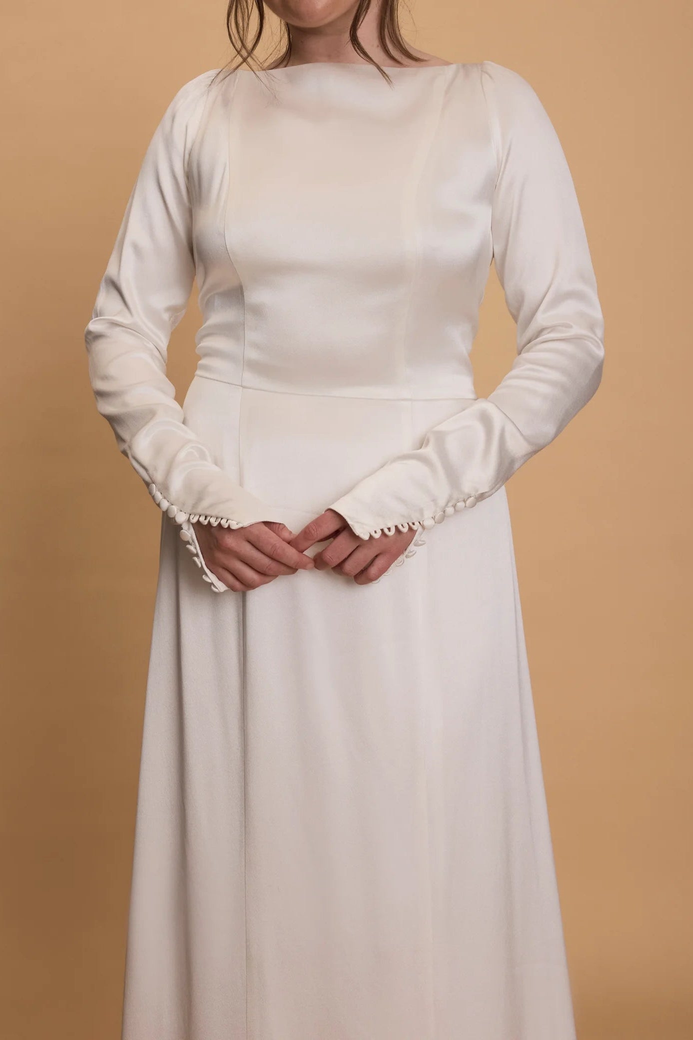 The Own Studio style 038, long sleeved white satin wedding gown, bridal